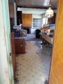 Living room has been cleared, but too late for the owner